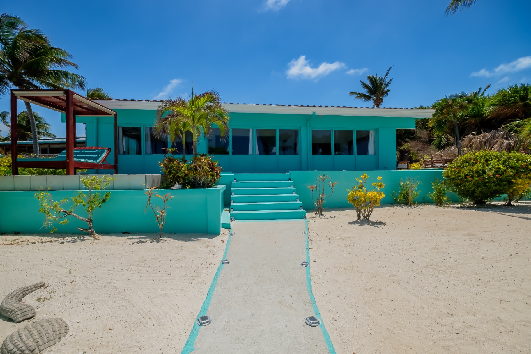 Turquoise Beach House exterior from the sand path