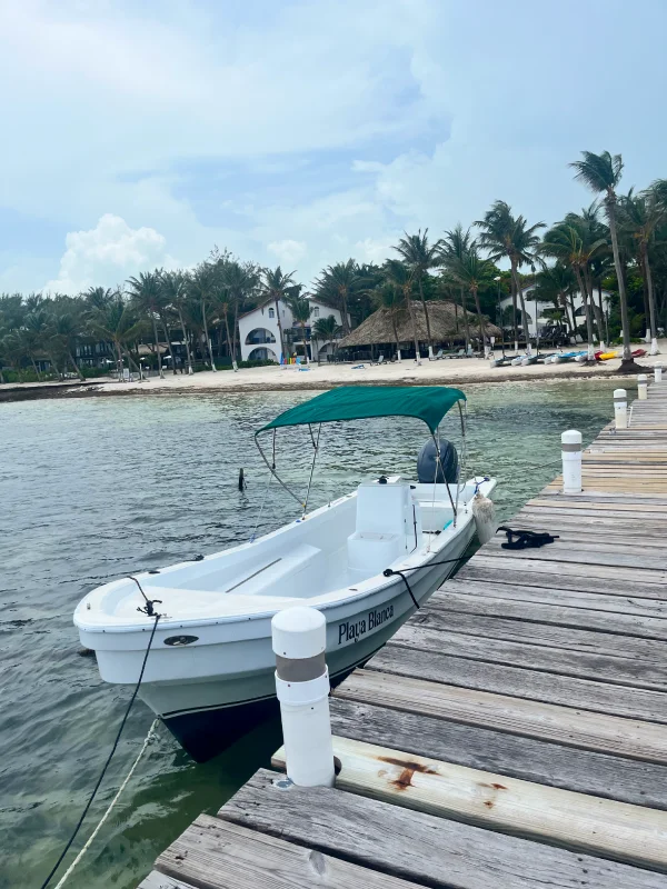 Private boat at the Playa Blanca dock, included with every stay