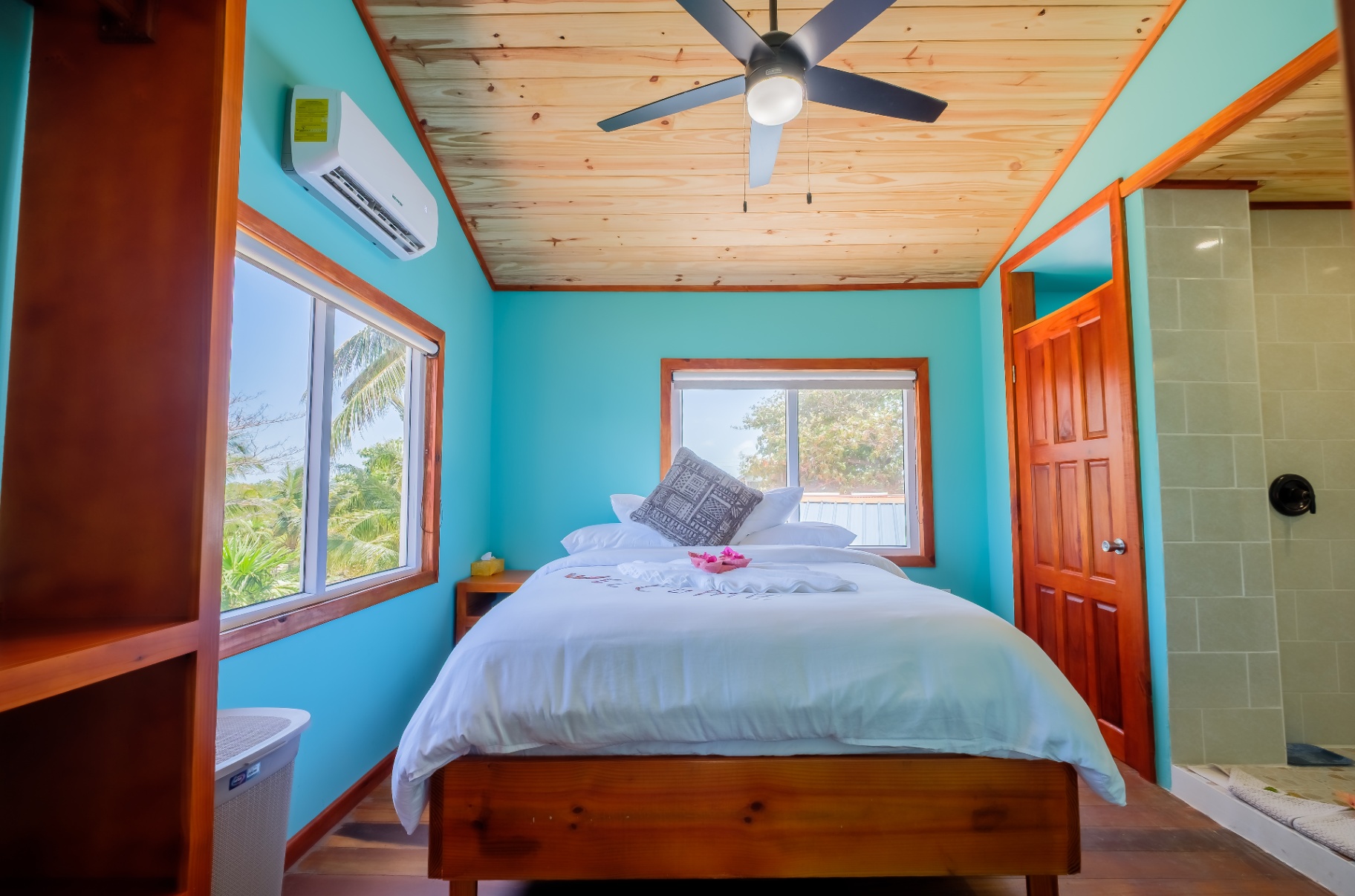 Queen bedroom with tropical garden views and ensuite shower
