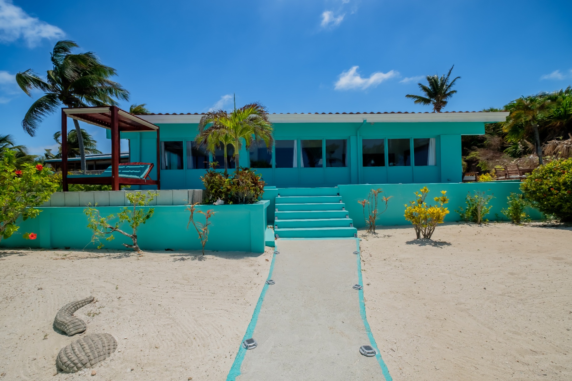 Turquoise Beach House facade from the sand