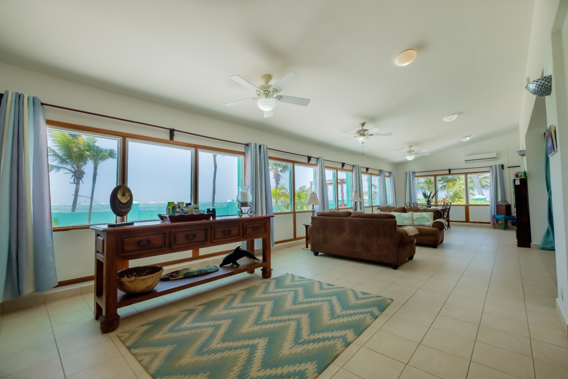 Panoramic living room with reef-facing windows
