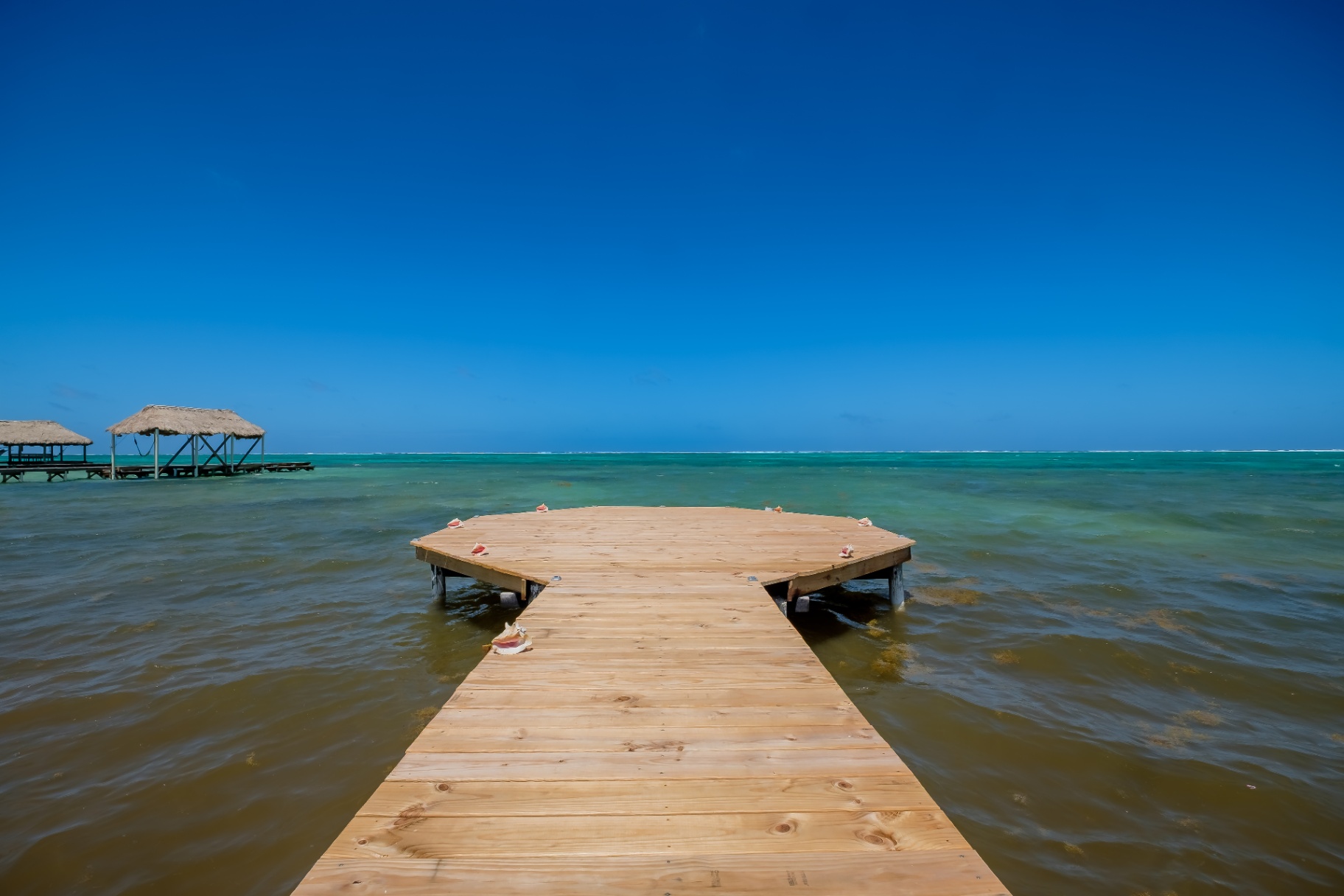Private dock over turquoise Caribbean water