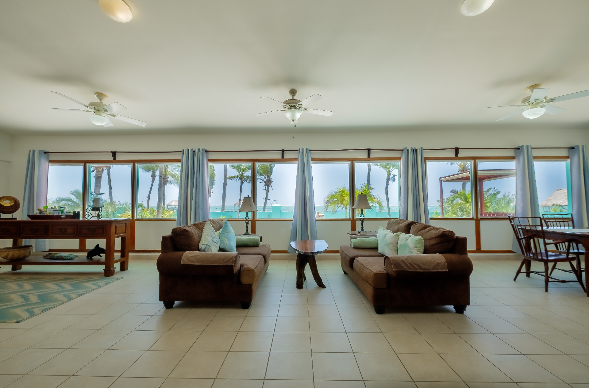 Wide living room with panoramic sea-view windows