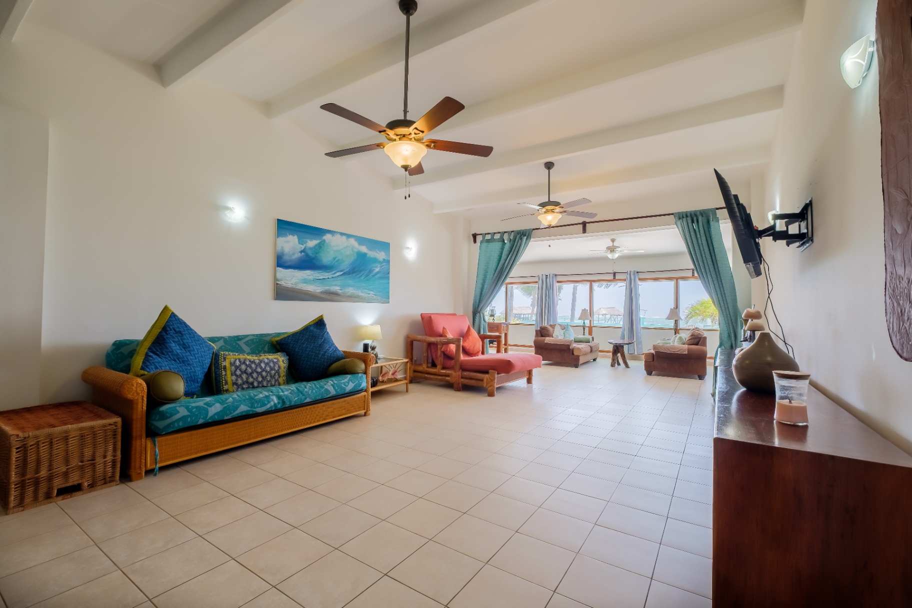 Wide great room opening to the beachfront